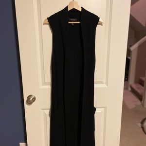 Long, black sweater vest in black